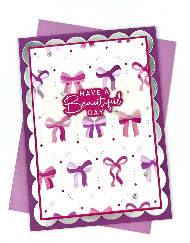 Handmade greeting card with bows on it and have a beautiful day sentiment on it.