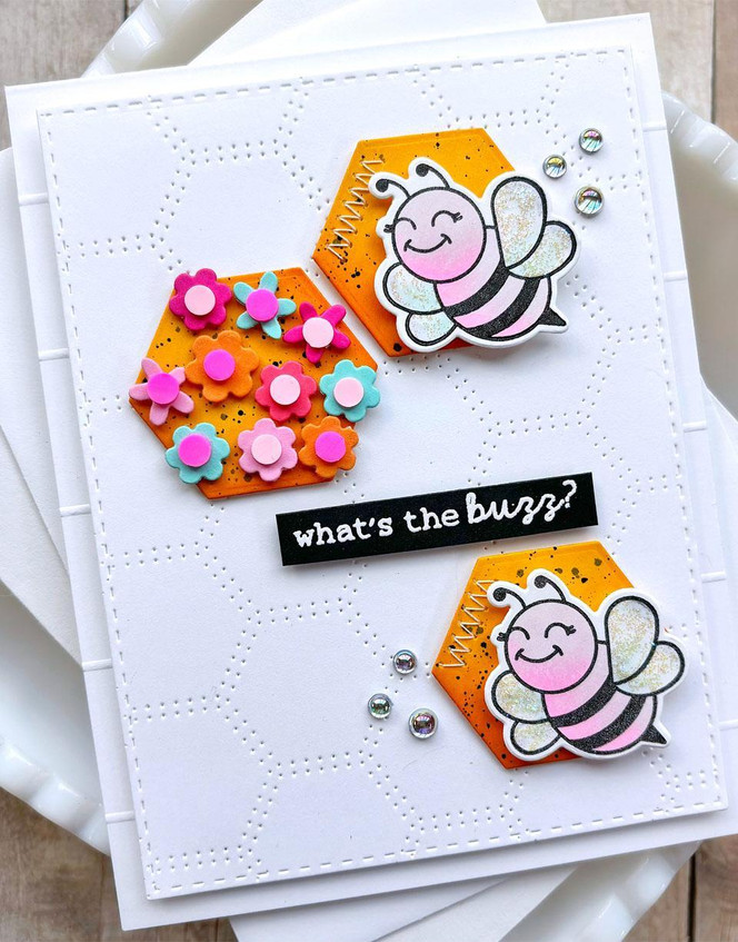 Handmade greeting card with bees on it and flowers with what's the buzz sentiment on it.