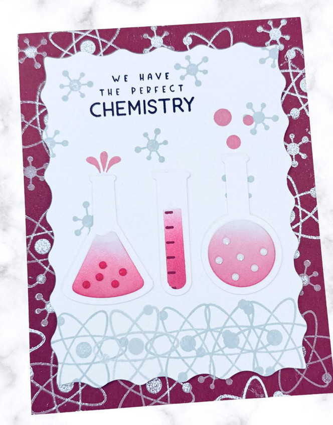 Handmade greeting card with pink chemistry bottles on it and we have the perfect chemistry sentiment on it.