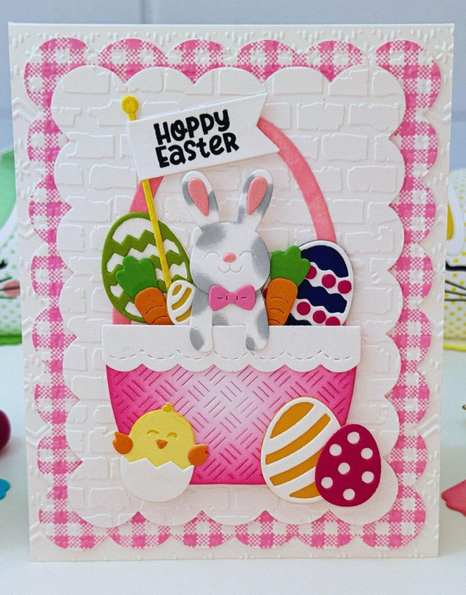 Handmade greeting card with a bunny in a basket on it and hoppy easter sentiment on it.