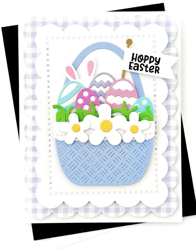 Handmade greeting card with a bunny in a basket on it and hoppy easter sentiment on it.
