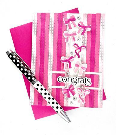 Handmade greeting card with bows on it and congrats sentiment on it.