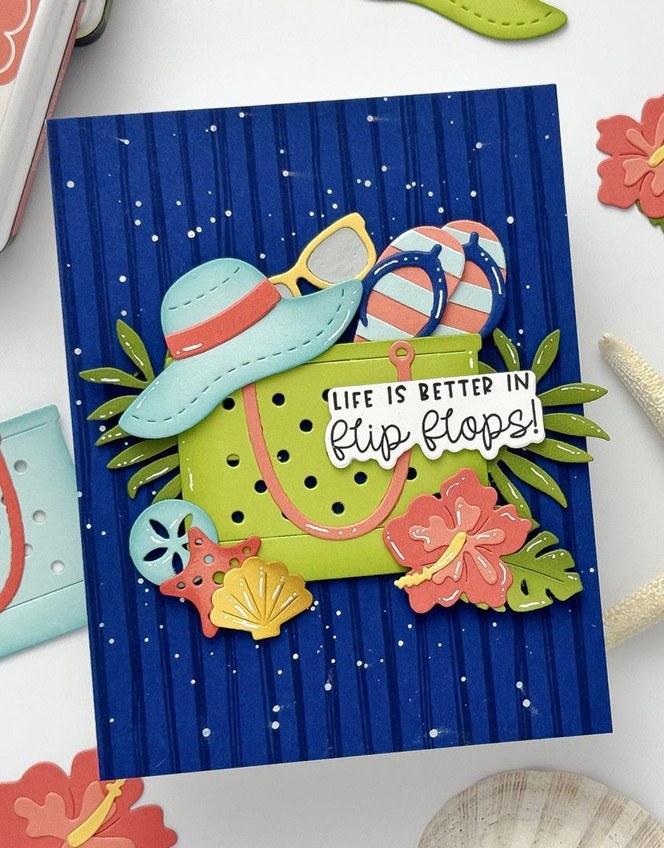 Handmade greeting card with beach bag on it and flip flops with life is better in flip flops sentiment on it.