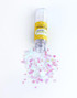 Image of Bits & Pieces - Sparkly Dots falling out of the tube they're in.