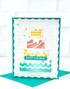 Handmade greeting card with cake on it and happy birthday sentiment on it.