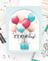 Handmade greeting card with balloons on it and it's your day sentiment on it.