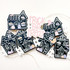 Handmade greeting tags with haunted houses and trick or treat sentiment on it.