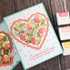 Handmade greeting card with a floral heart on it and congratulations on your wedding day sentiment on it.