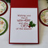 Inside of a greeting card with wishing you the wonder and joy of the season sentiment on it.