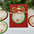 Handmade greeting card with ornament on it and Merry Christmas sentiment on it.
