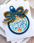 Handmade greeting card with ornament on it and peace on earth sentiment on it.