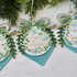 Handmade greeting tag with ornament on it and happy holidays sentiment on it.