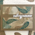 Handmade greeting card with feathers on it and in loving memory sentiment on it.