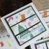 Handmade greeting card with Christmas decor on it and happy holidays sentiment on it.