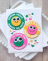 Handmade greeting card with smiley faces on it and various sentiments on each.