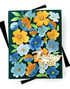 Handmade greeting card with flowers on it and thinking of you sentiment on it.
