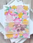 Handmade greeting card with flowers on it and thinking of you sentiment on it.