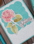 Handmade greeting card with flower on it and with sympathy sentiment on it.