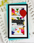 Handmade greeting card with triangles on it and a balloon with happy birthday sentiment on it.