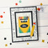 Handmade greeting card with crayon box on it and a pencil with a+ teacher sentiment on it.