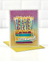 Handmade greeting card with cake on it and make a wish sentiment on it.