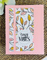 Handmade greeting card with leaves on it and cozy vibes sentiment on it.