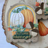 Handmade gift tag with pumpkins on it and autumn blessings sentiment on it.
