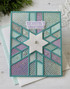 Handmade greeting card with snowflake pattern on it and season's greetings sentiment on it.