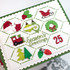 Handmade greeting card with Christmas trinkets on it and season's greetings sentiment on it and 25 sentiment on it.