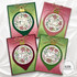 Four handmade greeting cards with ornaments on each and different holiday sentiments on each of them.