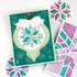 Handmade greeting card with ornament on it and pattern with let it snow sentiment on it.