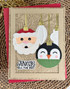 Handmade greeting card with Christmas ornaments on it and jingle all the way sentiment on it.