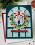 Handmade greeting card with wreath on it and all is merry & bright sentiment on it.
