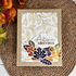Handmade fall greeting card featuring a gold foiled botanical frame, colorful autumn leaves, and an Autumn Greetings sentiment.
