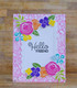 Handmade greeting card with flowers on it and hello friend sentiment on it.