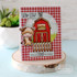 Handmade greeting card with a farm on it and a cow with holy cow sentiment and it's an udder birthday sentiment on it.