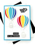 Handmade greeting card with hot air balloons on it and you lift me up sentiment on it.