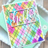 Handmade greeting card with argyle pattern on it and hello sentiment on it.