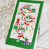 Handmade greeting card with elves and swirls on it with be merry sentiment on it.