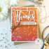 Handmade greeting card with swirls on it and thanks for your kindness sentiment on it with flowers in background.