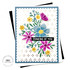 Handmade greeting card of flowers and thinking of you sentiment on it with cardstock in background.