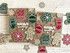 Two handmade greeting cards with gingerbread, ornaments, and snowflakes on them with season's greetings sentiment on it.