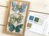 Handmade greeting card with butterflies on it and with love sentiment on it.