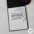 Inside of a handmade greeting card with bats on it and wishing you a hauntingly happy halloween sentiment on it.