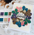 Handmade greeting card with leaves and acorns on it with let's celebrate sentiment on it.