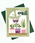 Handmade greeting card with plants in pots on it with get well soon sentiment on it.