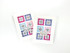 Two handmade greeting cards with snowflakes and postage on it with sending hugs sentiment on it.