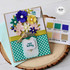 Handmade greeting card with flower bouquet in a vase with happy birthday sentiment on it.