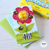 Handmade greeting card with shaker flower on it and bumble bees with hi sentiment on it.