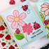 Handmade greeting card with lady bugs and flowers on it with hey, lady! You're awesome sentiment on it.